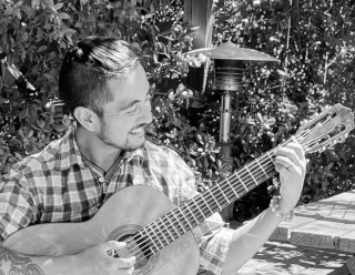 Miguel Buenaflor Black and White photo with Guitar