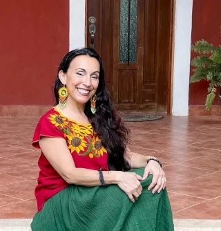 Erika Buenaflor sitting in the front porch
