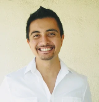 Miguel Buenaflor wearing a white shirt